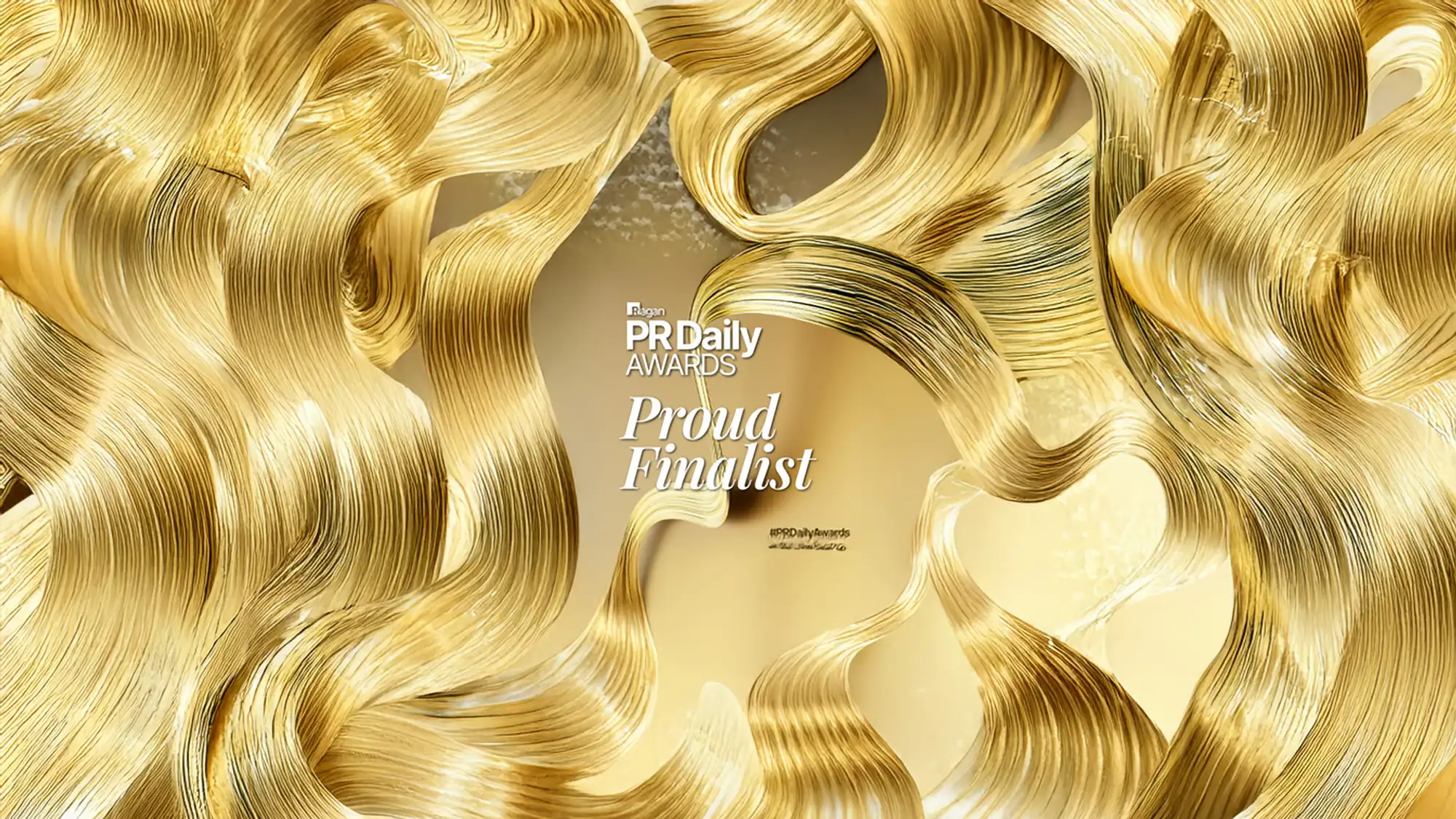 A golden swirl design through the text “Ragan PR Daily AWARDS Proud Finalist.